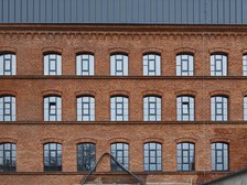 Elewacja z zabytkowej czerwonej cegły kamienicy przy ul. Tuwima 10 fot. Radosław Jóźwiak / UMŁ